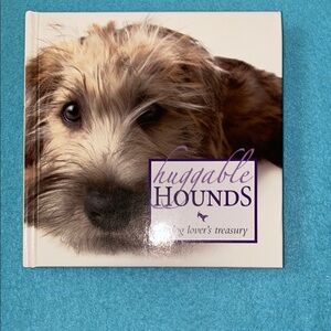 HUGGABLE HOUNDS A dog lover’s treasure coffee table book 117 pages 7” X 7” NEW